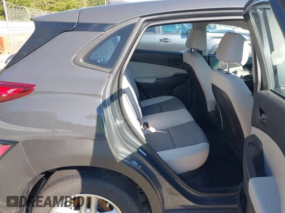 2023 Hyundai Kona SE with VIN KM8K2CAB3PU053438, listed as a IAAI auction lot 42996093 with 12,877 mi miles and . Bid and sale history available at DreamBid. Image 8.