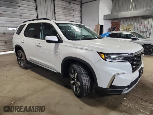 2025 Honda Pilot Touring с VIN 5FNYG1H72SB131215, выставлен на аукционе Copart как лот 71454255 с пробегом 2 925 миль миль и Списание • Salvage title. История ставок и продаж доступна на DreamBid. Изображение 4.