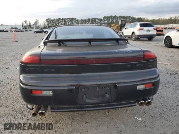 1992 Dodge Stealth with VIN JB3XE74C4NY050195, listed as a Copart auction lot 79440874 with 49,979 mi miles and Salvage title. Bid and sale history available at DreamBid. Image 6.
