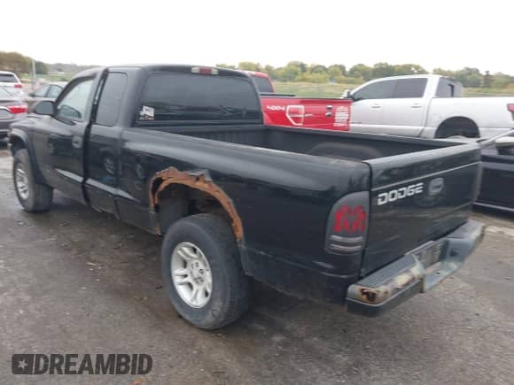 2001 Dodge Dakota Sport z VIN 1B7GG22N81S212519, wystawiony jako IAAI lot #43557080 z przebiegiem 150 028 mil mil oraz . Historia ofert i sprzedaży dostępna na DreamBid. Obrazek 3.