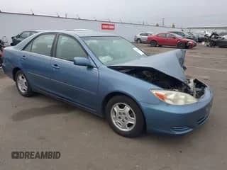 2002 Toyota Camry XLE with VIN 4T1BF32K02U519709, listed as a IAAI auction lot 43002567 with Not provided miles and . Bid and sale history available at DreamBid. Image 1.