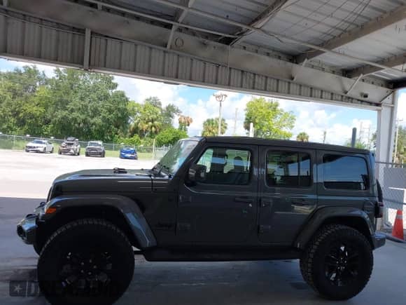 2023 Jeep Wrangler Sahara Altitude with VIN 1C4HJXEG0PW558839, listed as a IAAI auction lot 43001327 with 16,845 mi miles and . Bid and sale history available at DreamBid. Image 14.