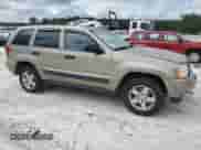 2005 Jeep Grand Cherokee Laredo z VIN 1J4HR48NX5C727601, wystawiony jako Copart lot #70047965 z przebiegiem 160 970 mil mil oraz Czysty tytuł • Clean title. Historia ofert i sprzedaży dostępna na DreamBid. Obrazek 4.