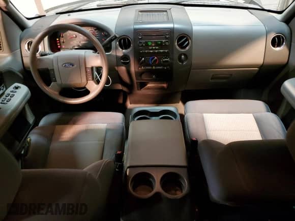 2007 Ford F-150 XLT с VIN 1FTRW02W07KA94452, выставлен на аукционе Copart как лот 47552485 с пробегом 335 643 миль миль и Списание • Salvage title. История ставок и продаж доступна на DreamBid. Изображение 8.