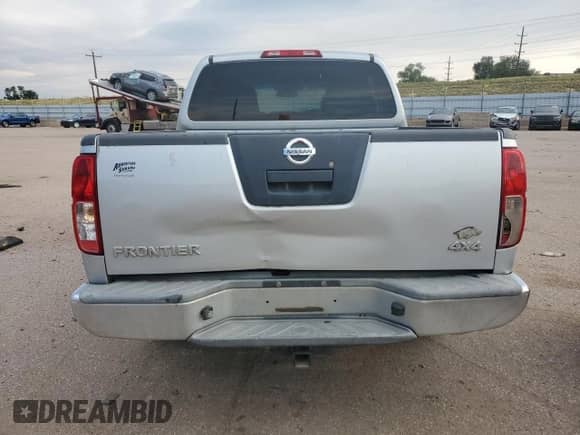 2007 Nissan Frontier SE z VIN 1N6AD07W57C428056, wystawiony jako Copart lot #67473095 z przebiegiem 119 662 mil mil oraz Szkoda całkowita • Salvage title. Historia ofert i sprzedaży dostępna na DreamBid. Obrazek 6.