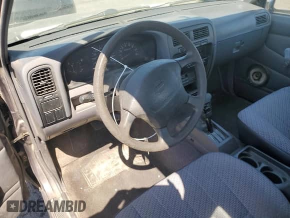 1997 Nissan Frontier XE with VIN 1N6SD16S3VC406983, listed as a Copart auction lot 60074865 with 209,171 mi miles and Clean title. Bid and sale history available at DreamBid. Image 8.