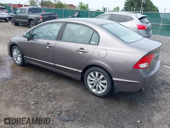 2009 Honda Civic with VIN 1HGFA15999L023648, listed as a IAAI auction lot 42292289 with 279,822 mi miles and . Bid and sale history available at DreamBid. Image 3.