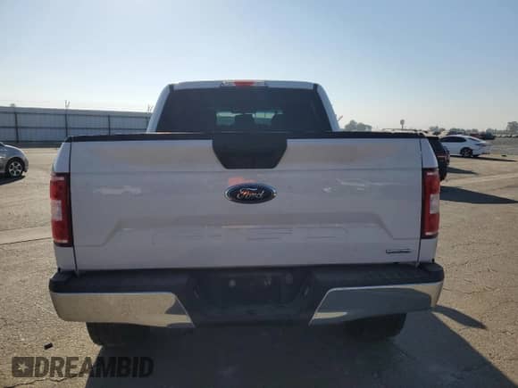 2018 Ford F-150 XLT z VIN 1FTEW1EG9JFA19483, wystawiony jako Copart lot #80747525 z przebiegiem 91 561 mil mil oraz Szkoda całkowita • Salvage title. Historia ofert i sprzedaży dostępna na DreamBid. Obrazek 6.