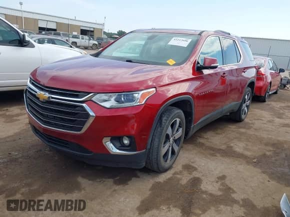 2018 Chevrolet Traverse LT with VIN 1GNERHKW1JJ116144, listed as a IAAI auction lot 43212606 with 121,318 mi miles and . Bid and sale history available at DreamBid. Image 2.
