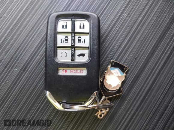 2024 Honda Odyssey Touring z VIN 5FNRL6H82RB040056, wystawiony jako IAAI lot #43286904 z przebiegiem 21 896 mil mil oraz . Historia ofert i sprzedaży dostępna na DreamBid. Obrazek 11.