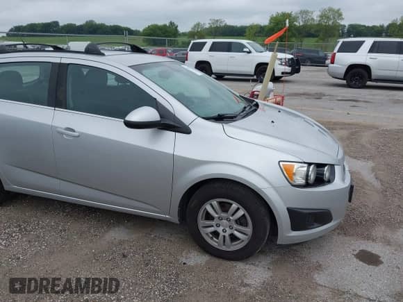 2012 Chevrolet Sonic LT with VIN 1G1JD6SBXC4214090, listed as a IAAI auction lot 42793504 with 152,185 mi miles and . Bid and sale history available at DreamBid. Image 13.