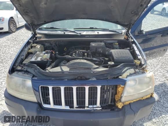 2004 Jeep Grand Cherokee Laredo with VIN 1J4GX48S14C220124, listed as a Copart auction lot 84979245 with 237,797 mi miles and Salvage title. Bid and sale history available at DreamBid. Image 12.