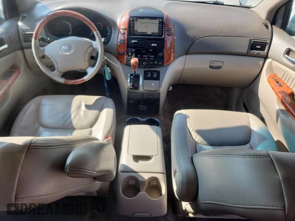 2010 Toyota Sienna XLE Limited с VIN 5TDYK4CC5AS300190, выставлен на аукционе Copart как лот 81425525 с пробегом 184 712 миль миль и Списание • Salvage title. История ставок и продаж доступна на DreamBid. Изображение 8.