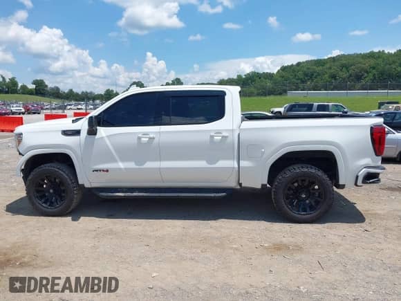2022 GMC Sierra 1500 AT4 with VIN 1GTP9EEL3NZ130961, listed as a IAAI auction lot 42704880 with 90,866 mi miles and . Bid and sale history available at DreamBid. Image 14.