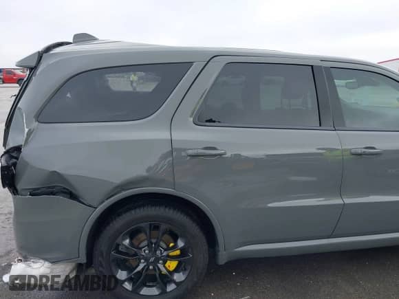 2022 Dodge Durango GT Plus z VIN 1C4RDJDG3NC206279, wystawiony jako IAAI lot #42116394 z przebiegiem Nie podano mil oraz . Historia ofert i sprzedaży dostępna na DreamBid. Obrazek 19.