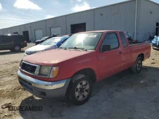 1998 Nissan Frontier XE with VIN 1N6DD26S9WC339936, listed as a Copart auction lot 80301365 with 269,326 mi miles and Clean title. Bid and sale history available at DreamBid. Image 1.