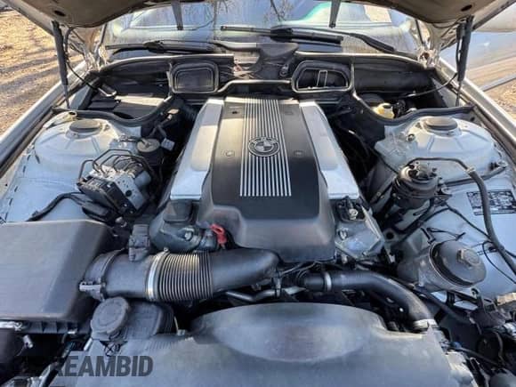 2000 BMW 7 Series 740iL with VIN WBAGH8346YDP07884, listed as a Copart auction lot 46376535 with 165,505 mi miles and Clean title. Bid and sale history available at DreamBid. Image 7.