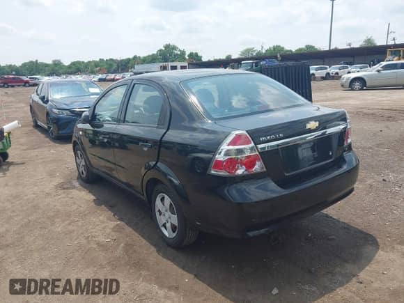 2007 Chevrolet Aveo LS with VIN KL1TD56627B055436, listed as a IAAI auction lot 42462092 with 102,923 mi miles and . Bid and sale history available at DreamBid. Image 3.