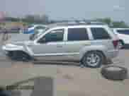 2009 Jeep Grand Cherokee Laredo with VIN 1J8GR48KX9C520745, listed as a IAAI auction lot 43341156 with 171,205 mi miles and . Bid and sale history available at DreamBid. Image 14.