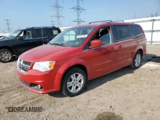 2013 Dodge Grand Caravan Crew with VIN 2C4RDGDG4DR648562, listed as a Copart auction lot 67687185 with 76,182 mi miles and Salvage title. Bid and sale history available at DreamBid. Image 1.