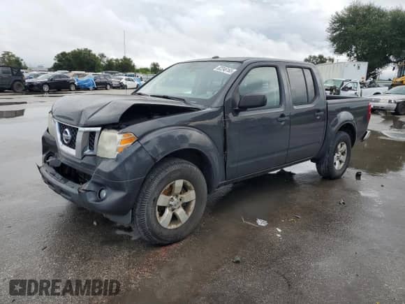 2015 Nissan Frontier SV with VIN 1N6AD0ERXFN761126, listed as a Copart auction lot 82246165 with 194,069 mi miles and Salvage title. Bid and sale history available at DreamBid. Image 1.