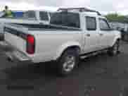 2000 Nissan Frontier XE with VIN 1N6ED27Y2YC355776, listed as a IAAI auction lot 42107613 with 235,461 mi miles and . Bid and sale history available at DreamBid. Image 4.