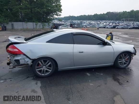 2005 Honda Accord EX-L with VIN 1HGCM81735A010407, listed as a IAAI auction lot 42914661 with 141,076 mi miles and . Bid and sale history available at DreamBid. Image 14.