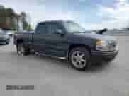 2002 GMC Sierra 1500 Denali z VIN 2GTFK69U221383430, wystawiony jako Copart lot #47127615 z przebiegiem 256 422 mil mil oraz Szkoda całkowita • Salvage title. Historia ofert i sprzedaży dostępna na DreamBid. Obrazek 4.