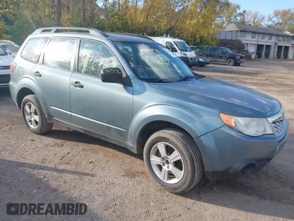 2013 Subaru Forester X z VIN JF2SHABC2DG404463, wystawiony jako IAAI lot #43484772 z przebiegiem 124 406 mil mil oraz . Historia ofert i sprzedaży dostępna na DreamBid. Obrazek 1.