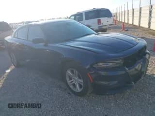 2015 Dodge Charger SE with VIN 2C3CDXBG1FH811898, listed as a IAAI auction lot 42086215 with 112,722 mi miles and . Bid and sale history available at DreamBid. Image 1.