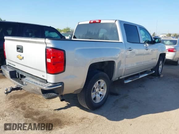 2017 Chevrolet Silverado 1500 LT with VIN 3GCPCREH8HG409895, listed as a IAAI auction lot 43413279 with 127,528 mi miles and . Bid and sale history available at DreamBid. Image 4.
