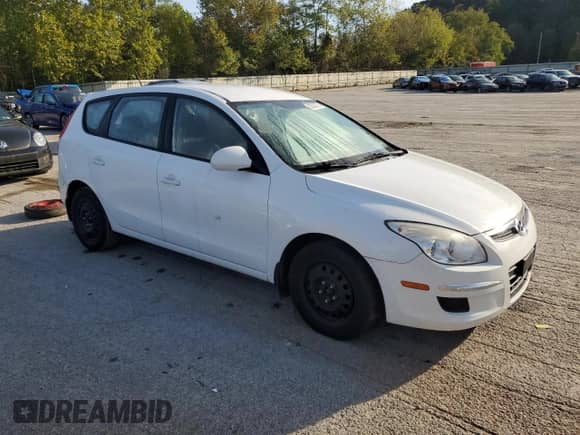 2012 Hyundai Elantra GLS z VIN KMHDB8AE5CU130952, wystawiony jako Copart lot #82003535 z przebiegiem 124 923 mil mil oraz Szkoda całkowita • Salvage title. Historia ofert i sprzedaży dostępna na DreamBid. Obrazek 4.