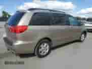 2010 Toyota Sienna CE z VIN 5TDKK4CC5AS336015, wystawiony jako Copart lot #87038765 z przebiegiem 241 385 mil mil oraz Szkoda całkowita • Salvage title. Historia ofert i sprzedaży dostępna na DreamBid. Obrazek 3.
