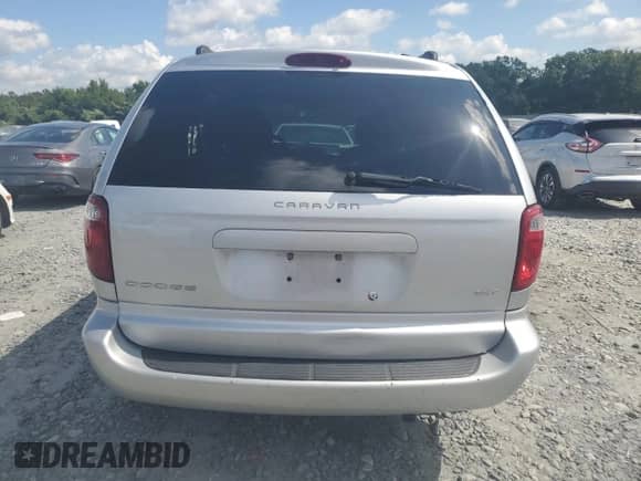 2004 Dodge Caravan SXT with VIN 1D4GP45R64B569005, listed as a Copart auction lot 64564485 with 118,809 mi miles and Salvage title. Bid and sale history available at DreamBid. Image 6.