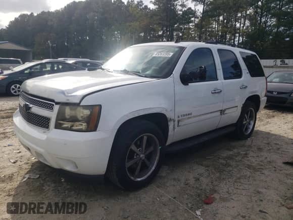 2009 Chevrolet Tahoe LTZ с VIN 1GNFK33089J100122, выставлен на аукционе Copart как лот 85353205 с пробегом 226 631 миль миль и Списание • Salvage title. История ставок и продаж доступна на DreamBid. Изображение 1.