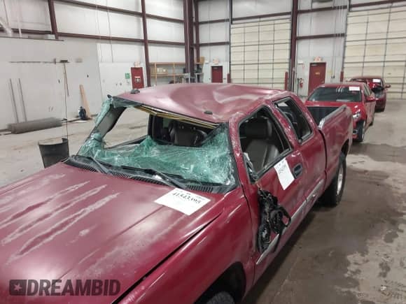 2005 GMC Sierra 1500 SLE with VIN 2GTEK19B551288460, listed as a IAAI auction lot 41543395 with 303,314 mi miles and . Bid and sale history available at DreamBid. Image 6.