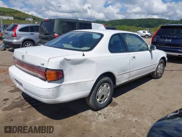1994 Toyota Camry LE z VIN 4T1SK12C1RU432937, wystawiony jako IAAI lot #43004501 z przebiegiem 210 134 mil mil oraz . Historia ofert i sprzedaży dostępna na DreamBid. Obrazek 4.