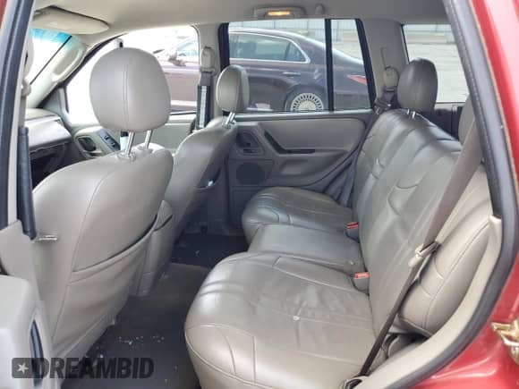 2002 Jeep Grand Cherokee Sport with VIN 1J4GW38S72C252344, listed as a Copart auction lot 61769485 with 306,152 mi miles and Salvage title. Bid and sale history available at DreamBid. Image 11.