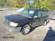 1999 Subaru Forester L with VIN JF1SF6357XG720470, listed as a IAAI auction lot 43368789 with 165,000 mi miles and . Bid and sale history available at DreamBid. Image 2.