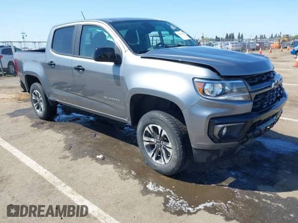 2021 Chevrolet Colorado 4WD Z71 z VIN 1GCGTDEN9M1249916, wystawiony jako IAAI lot #41947042 z przebiegiem 26 842 mil mil oraz . Historia ofert i sprzedaży dostępna na DreamBid. Obrazek 1.