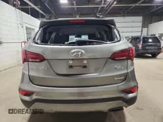 2017 Hyundai Santa Fe 2.4L z VIN 5NMZTDLB2HH001620, wystawiony jako Copart lot #86635355 z przebiegiem 84 897 mil mil oraz Czysty tytuł • Clean title. Historia ofert i sprzedaży dostępna na DreamBid. Obrazek 6.