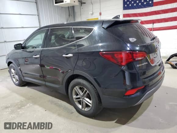 2017 Hyundai Santa Fe 2.4L z VIN 5XYZTDLB8HG440279, wystawiony jako Copart lot #84611545 z przebiegiem 100 644 mil mil oraz Szkoda całkowita • Salvage title. Historia ofert i sprzedaży dostępna na DreamBid. Obrazek 2.