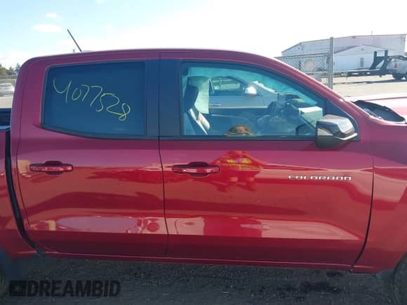 2023 Chevrolet Colorado 4WD Z71 with VIN 1GCPTDEKXP1210133, listed as a IAAI auction lot 40777528 with 21,464 mi miles and . Bid and sale history available at DreamBid. Image 13.