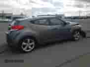 2014 Hyundai Veloster z VIN KMHTC6AD8EU194443, wystawiony jako Copart lot #60059565 z przebiegiem 201 848 mil mil oraz Szkoda całkowita • Salvage title. Historia ofert i sprzedaży dostępna na DreamBid. Obrazek 3.