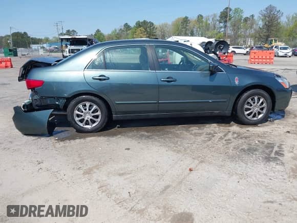 2005 Honda Accord LX with VIN 1HGCM56445A151354, listed as a IAAI auction lot 42027064 with 211,663 mi miles and . Bid and sale history available at DreamBid. Image 13.
