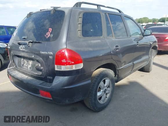 2005 Hyundai Santa Fe GLS z VIN KM8SC73D55U879756, wystawiony jako IAAI lot #42622452 z przebiegiem 215 926 mil mil oraz . Historia ofert i sprzedaży dostępna na DreamBid. Obrazek 4.