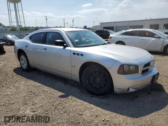 2007 Dodge Charger with VIN 2B3KA43GX7H603664, listed as a Copart auction lot 69035335 with 122,950 mi miles and Salvage title. Bid and sale history available at DreamBid. Image 4.