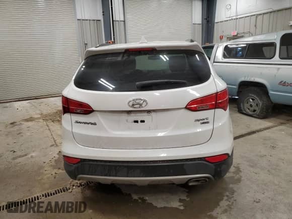 2014 Hyundai Santa Fe с VIN 5XYZUDLBXEG165099, выставлен на аукционе Copart как лот 72031075 с пробегом 88 160 миль миль и Чистый • Clean title. История ставок и продаж доступна на DreamBid. Изображение 6.