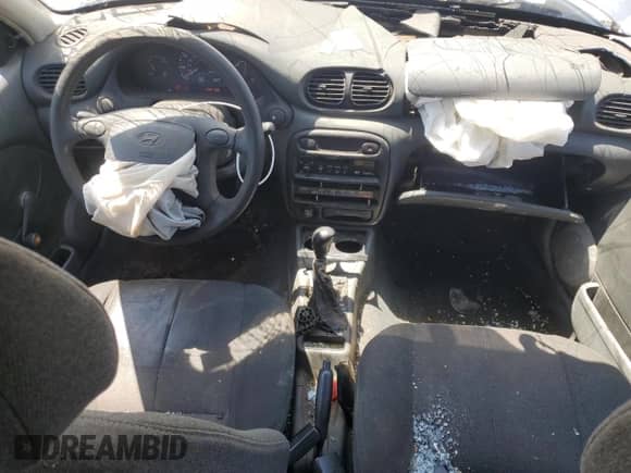 1999 Hyundai Accent L z VIN KMHVD14N9XU497814, wystawiony jako Copart lot #60374665 z przebiegiem 287 585 mil mil oraz Szkoda całkowita • Salvage title. Historia ofert i sprzedaży dostępna na DreamBid. Obrazek 8.