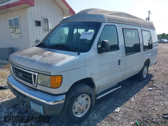 2004 Ford Econoline Cargo with VIN 1FTNS24WX4HA92137, listed as a IAAI auction lot 42888080 with 158,035 mi miles and . Bid and sale history available at DreamBid. Image 2.